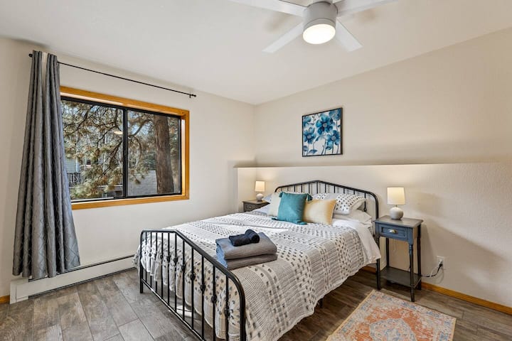 Downstairs/ basement bedroom #12 one queen bed, bedside charging and closet space. 
