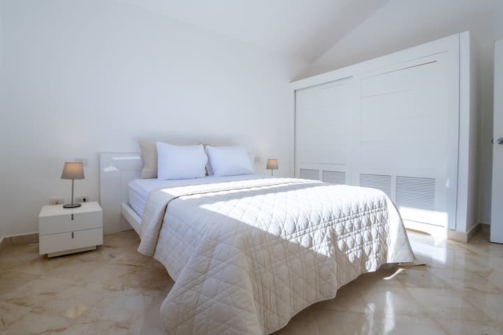 The bedrooms are thoughtfully arranged, providing ample storage space and a welcoming atmosphere.