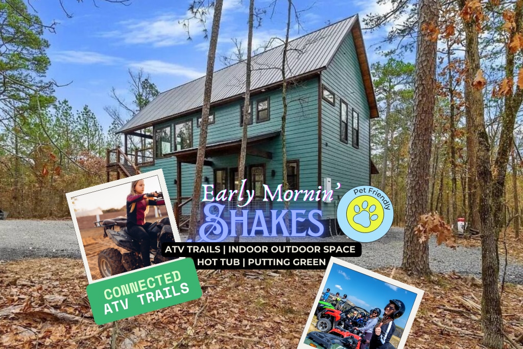 A rustic cabin is surrounded by trees, showcasing a two-story structure with a dark green facade. Outdoor gravel space is visible, including a large parking area suitable for ATVs and trailers. Informational graphics highlight connected ATV trails and pet-friendly amenities.