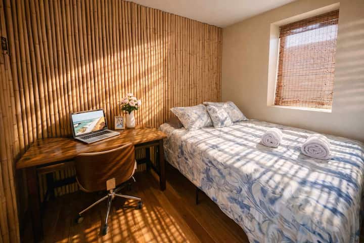 Private Bedroom with Dedicated Workspace • Comfortable Bed, Natural Light and a Quiet Work-Friendly Setting • Perfect for Remote Work, Conference Attendees and Extended Stays • A Peaceful Space to Recharge, Focus and Rest Between Group Activities