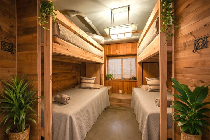 Private King Bedroom Retreat • Comfortable King Bed, Natural Light & Relaxing Atmosphere • A Quiet Place to Recharge Between Meetings, Adventures and Group Activities • Designed for Restful Nights and Productive Days in Downtown San Diego
