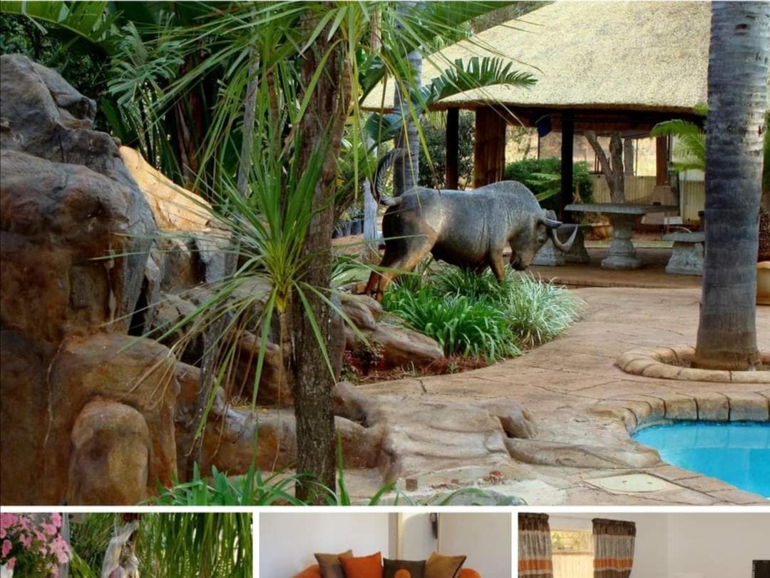 A serene outdoor space features lush greenery and sculpted rock formations. A decorative statue of a bull enhances the natural setting, accompanied by a sheltered seating area. The pool reflects the surrounding foliage, creating a tranquil environment for relaxation.