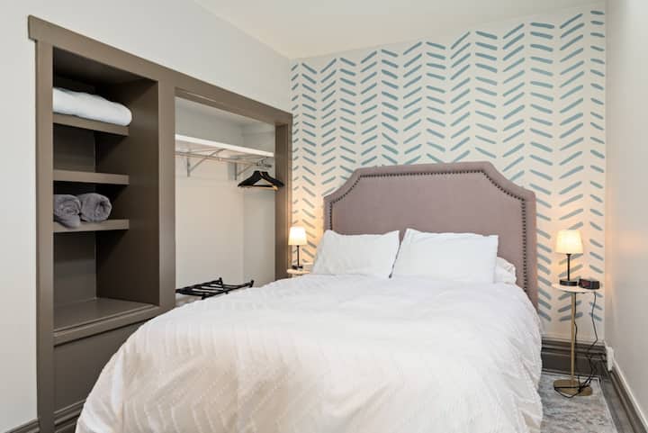Bedroom With Closet, Queen Bed and Skylight