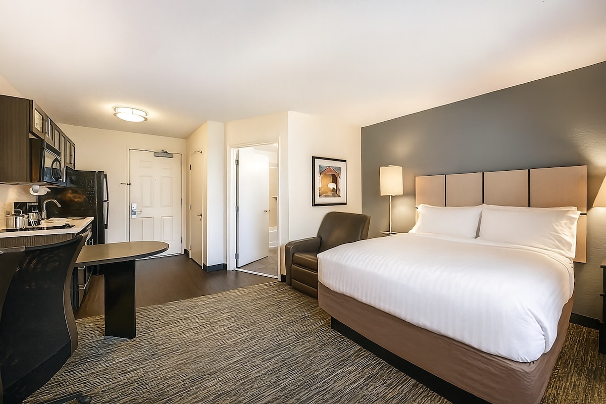 Sink into plush bedding and unwind in a serene retreat.