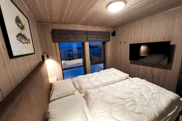 Bedroom 1 with smart TV and fjord view