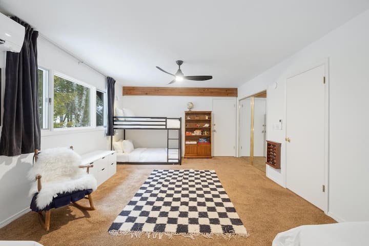 Guestroom 4 (2nd Floor) - 2 twin beds and 1 twin bunk bed.