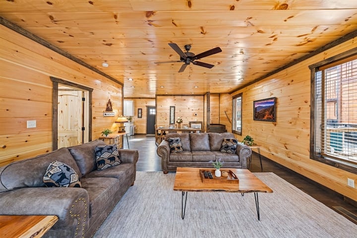 Main level: living room #1 w/ smart TV (Dish TV) and a queen sleeper sofa.