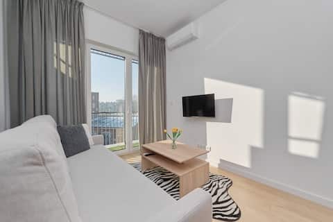 Popular Airbnb listing: Modern Apartment | Parking, Balcony, Workspace in Tarnogaj