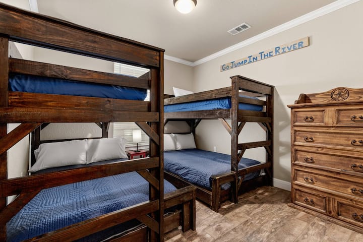 Create unforgettable memories by jumping into the river, and not the solid-wood bunk guest bunk beds.