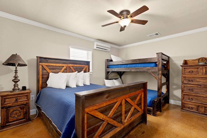 The downstairs suite is the perfect accommodation for a cozy and flexible stay at your welcoming Guadalupe River vacation retreat.