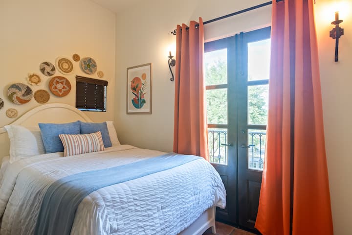 Bedroom 7 features a queen bed and balcony.