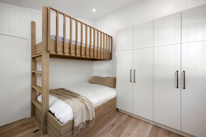 Settle into the Barn’s double bedroom (single bunk not available), complete with ample storage and a relaxed vibe that makes it an ideal retreat for teens.