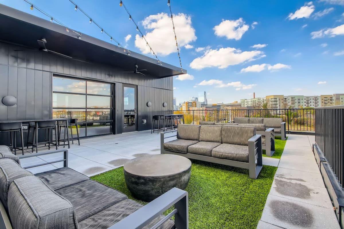 Gold Note Suite rooftop lounge with skyline views