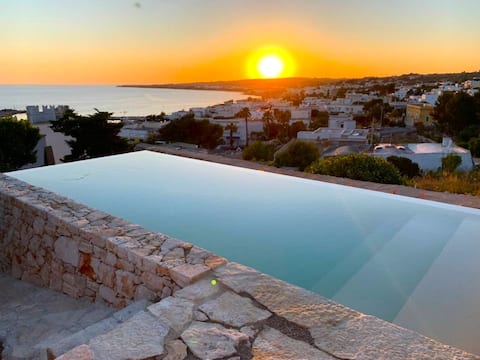 Sunset view, infinity pool, little stone house