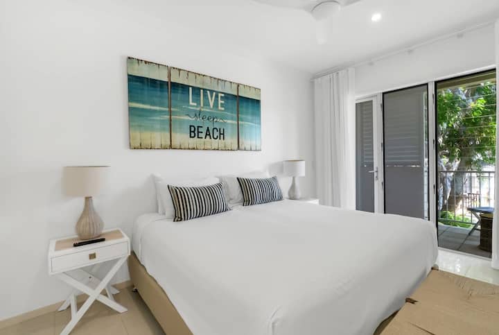 Rest easy in the second bedroom, set with two single beds—which can be pushed together to create a king bed upon request—and a bookshelf full of good reads.