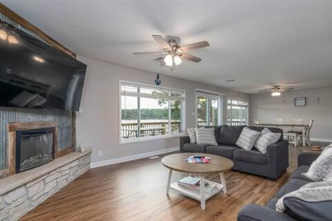 Breathtaking Lake Views & Grand Dock Await You!