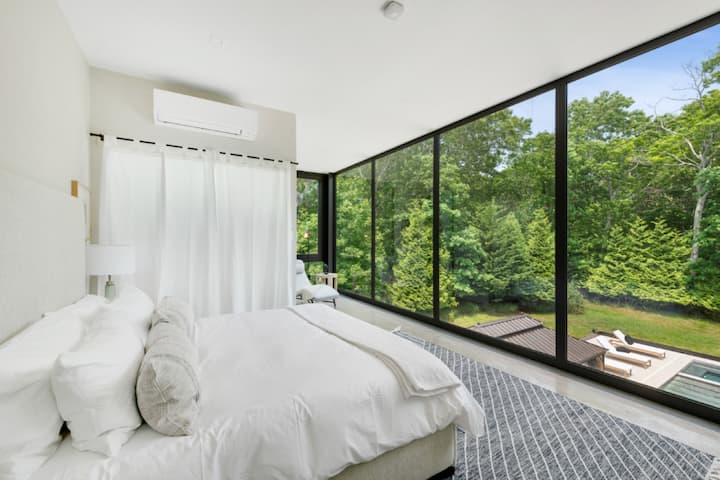 Escape to a calm bedroom setting, where the serene decor and comfortable furnishings are perfectly suited for soothing the soul and finding your zen.