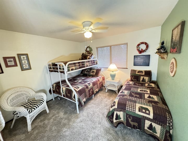 Ideal children's room...twin over full bunk plus additional twin.