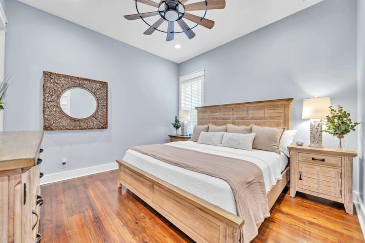 Private master retreat with plush bedding and elegant touches.