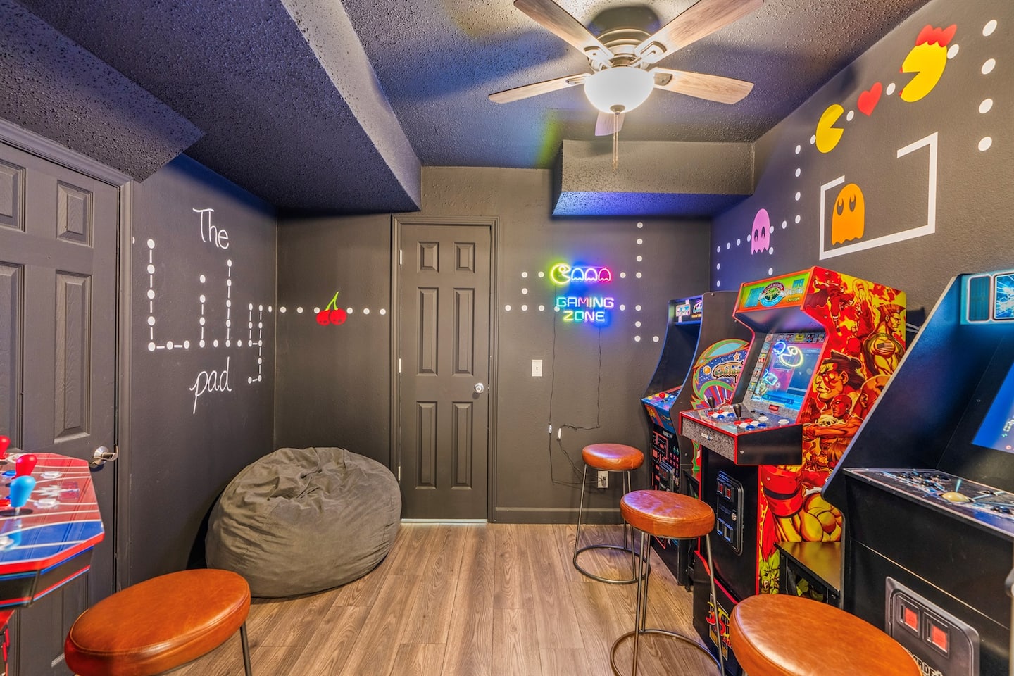 You'll know you found the right door the second you spot 'The Lily Pad' spelled out in Pac-Man dots on the arcade wall