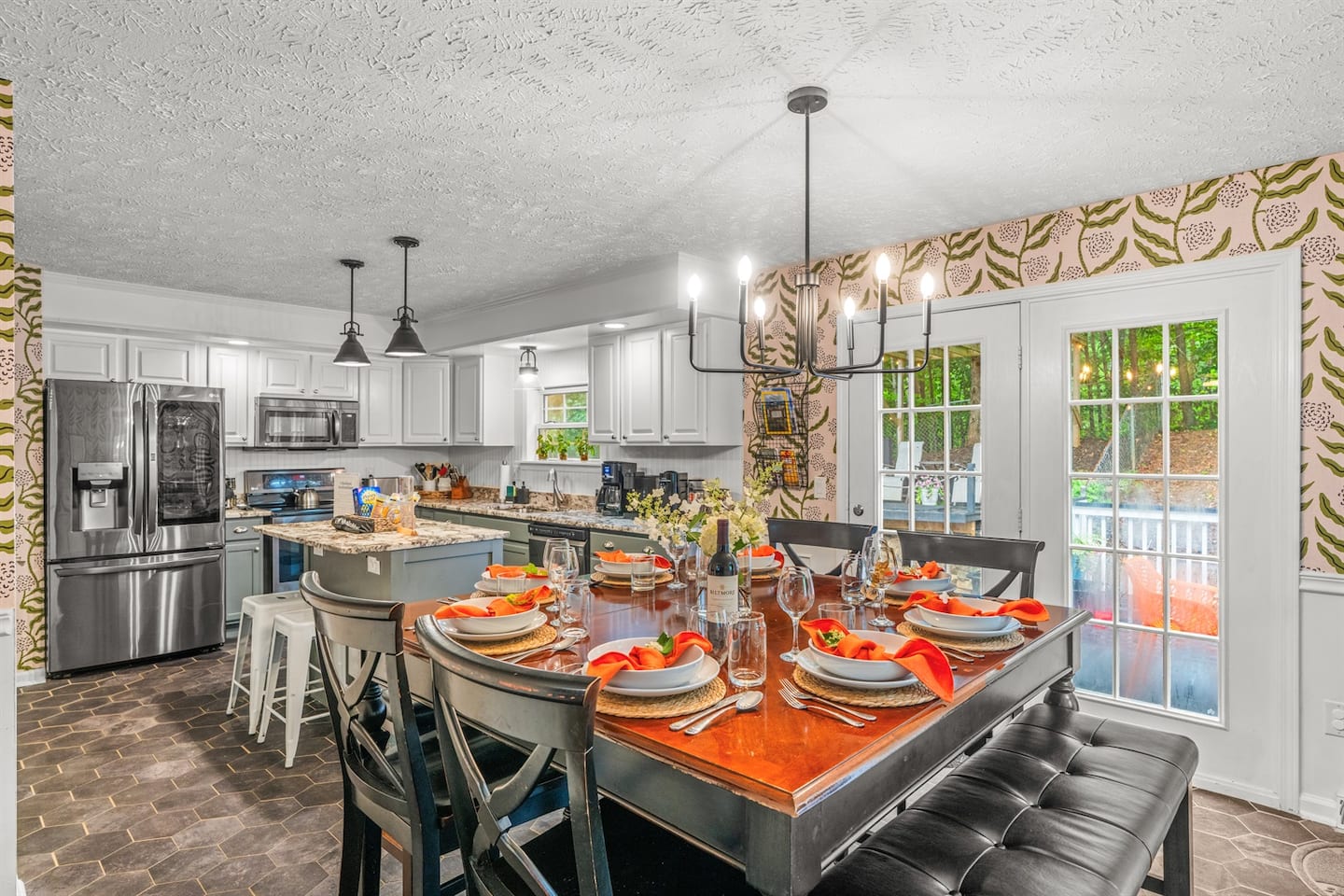 Pull up a chair at a table set for eight, pour the wine, and let the kitchen just behind you do the rest