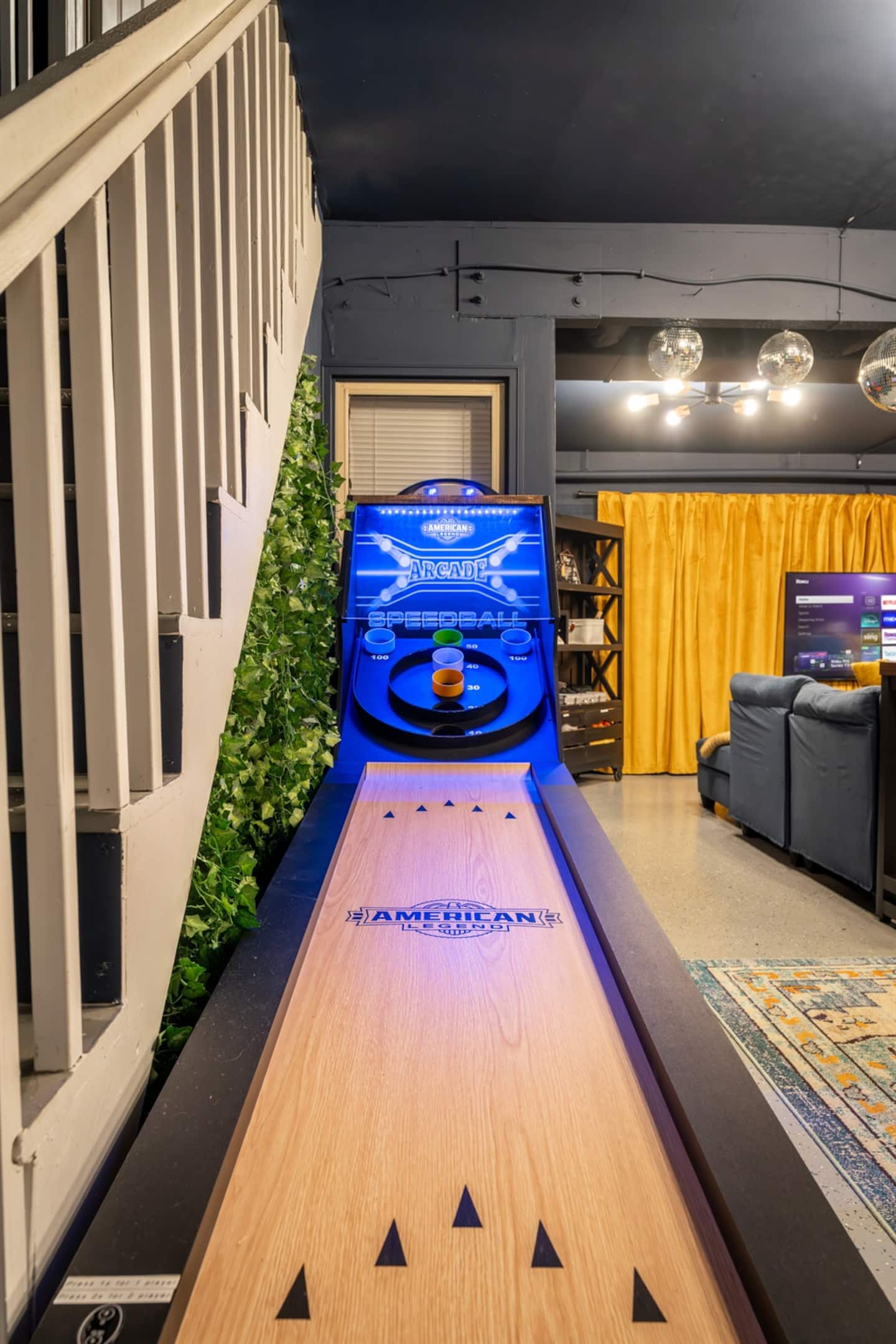 Line up a shot on the Skeeball game and see who can out-roll the group