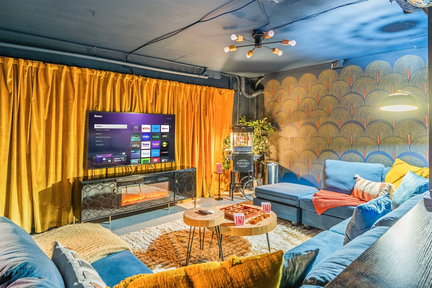 You've got a spot on this sectional for all ten of you, plus popcorn from the cart in the corner