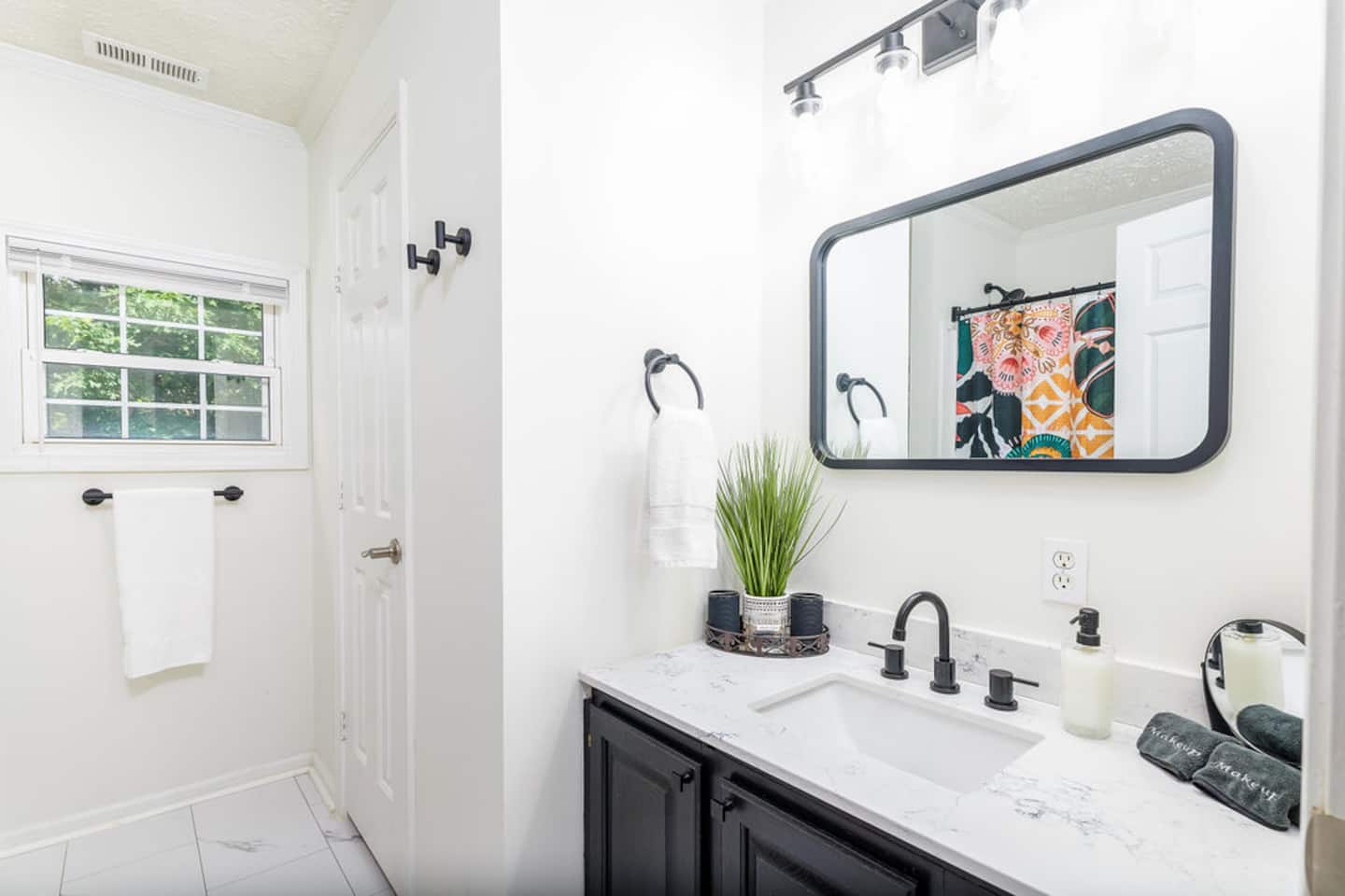 You'll never wait in the hallway with this upstairs bathroom keeping the morning rush moving