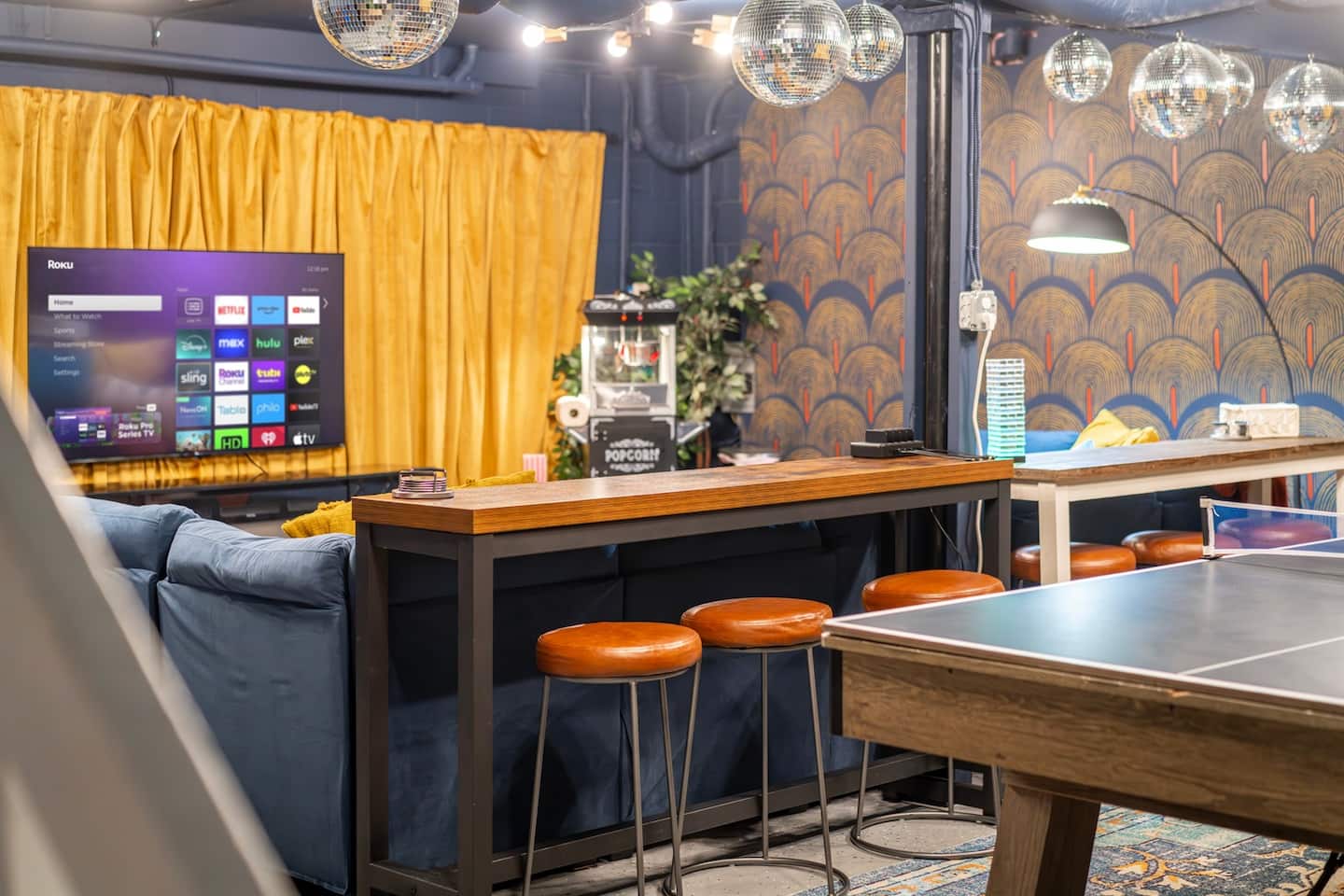 Pop the popcorn, dim the lights, and let the group sink into the movie lounge
