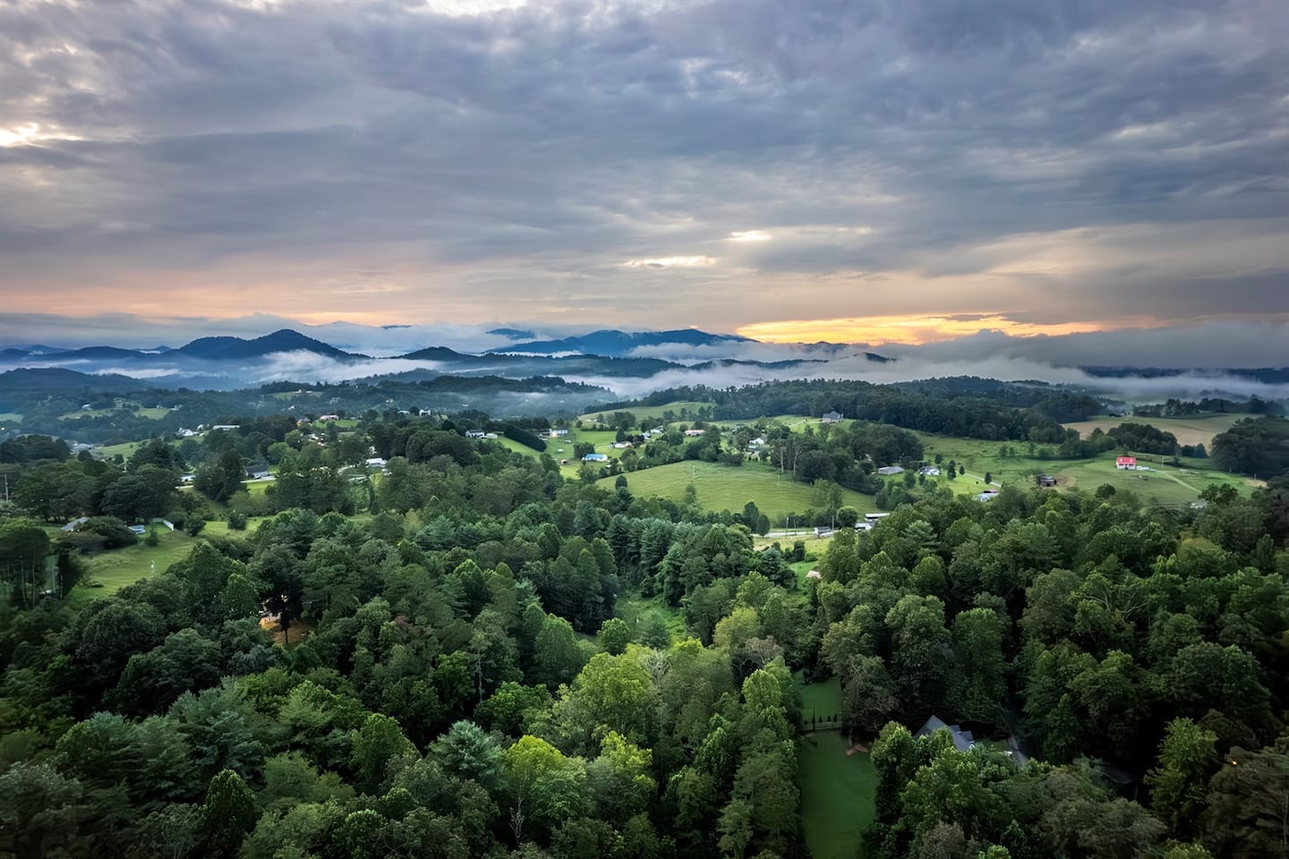 From above, you can see how the house sits tucked into the trees, with the Blue Ridge rolling out beyond