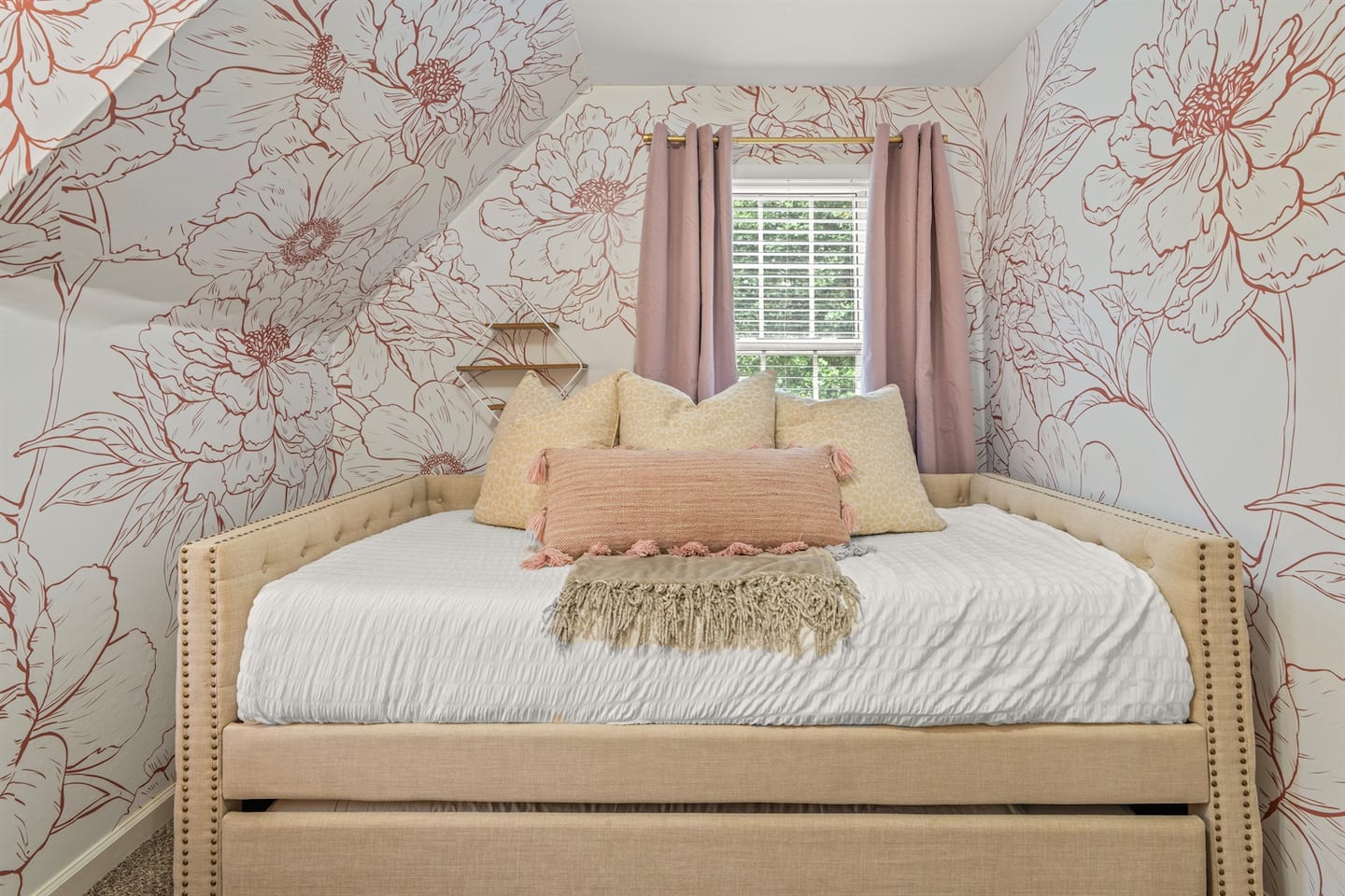 You'll find a hidden closet tucked into this room, plus a little desk corner for coloring books and quiet time