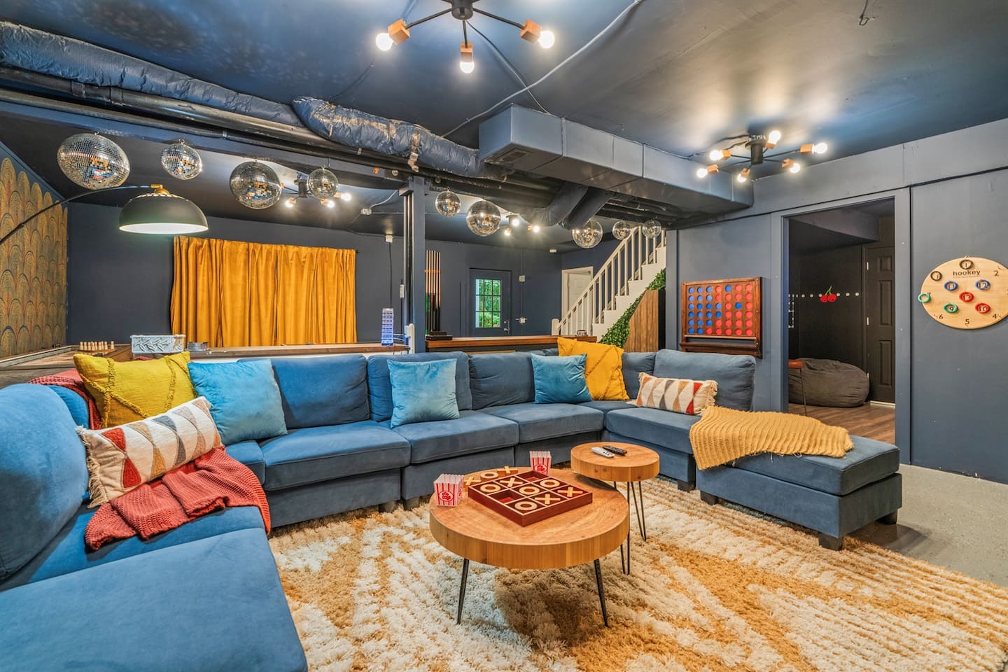 Ten of you can sit down here at once, disco balls included, and the sectional doubles as a comfortable bed for your 14th