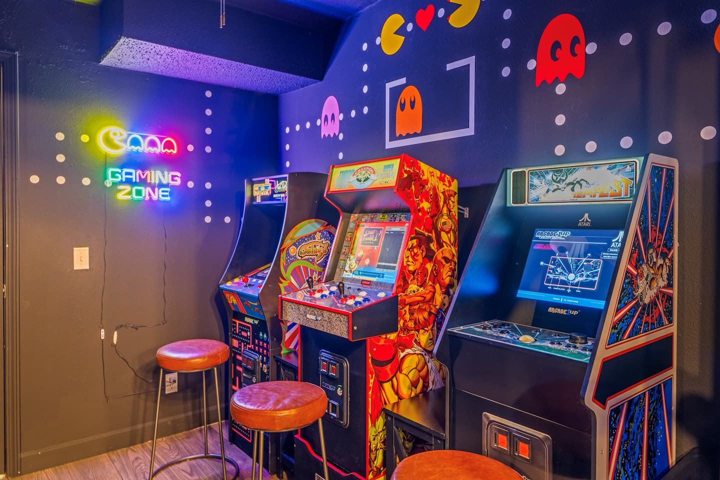 Grab a stool under the neon Gaming Zone sign and challenge the table to arcade bragging rights