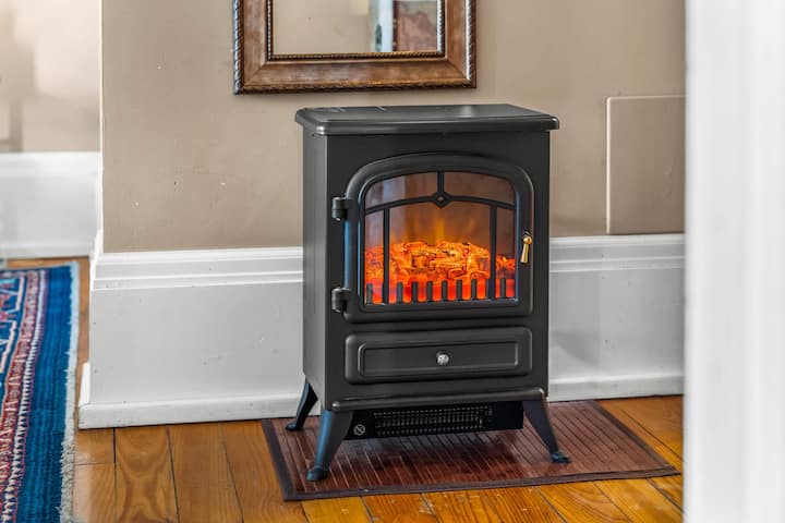 【Primary Bedroom】 Portable electric fireplace for cold Leadville nights — extra warmth on demand