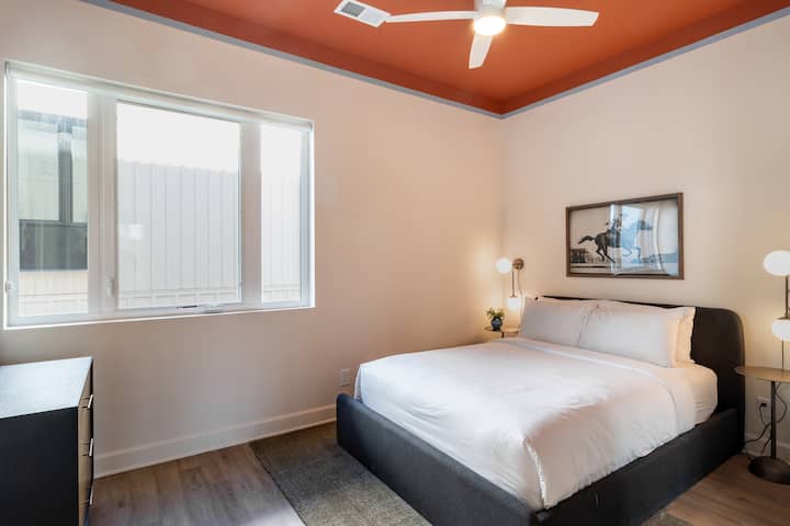 Bedroom 2 features a queen bed and ensuite bathroom.