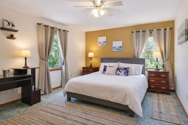 Serene Bedroom: Bright spaces with a queen bed, stylish decor, and tranquil views await you!