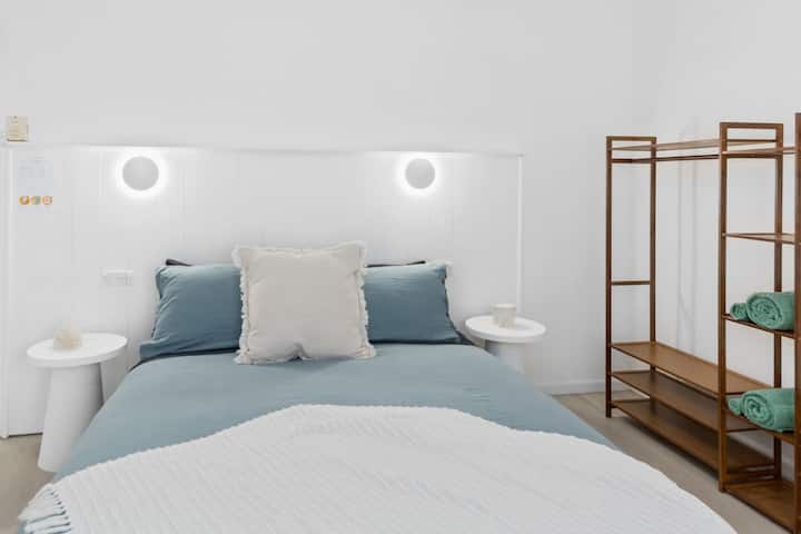 The first bedroom comes with a plush queen-sized bed, and plenty of storage space for your belongings.
