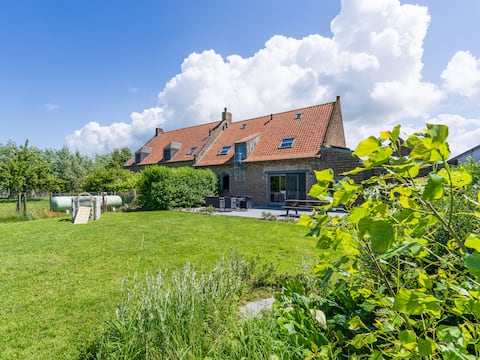 Family house on a farm by the sea