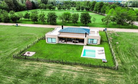 Luxury retreat: Modern house with garden and pool