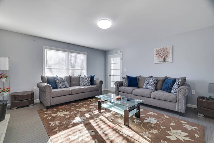 Modern comfort with a touch of rustic style - this living room sofa is the perfect place to unwind with a throw pillow