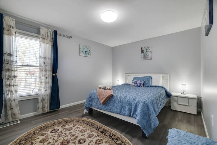 Our spacious bedroom offers ample room to relax and recharge.