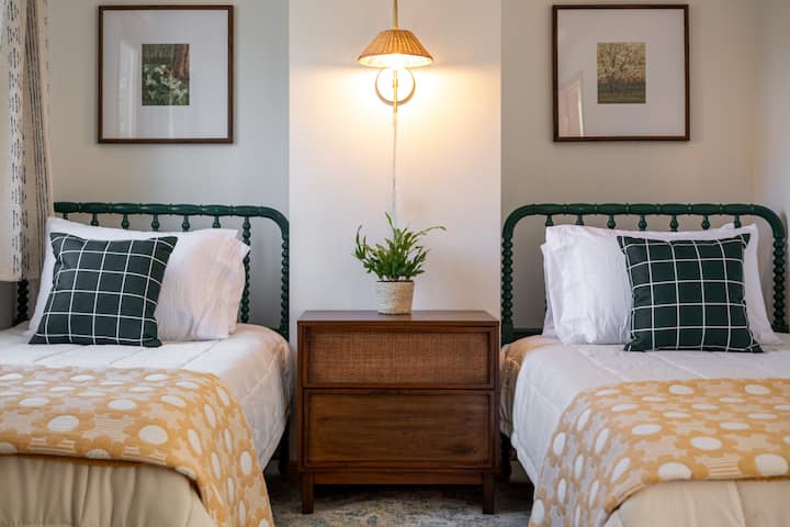 All bedrooms feature black out curtains and local art work
