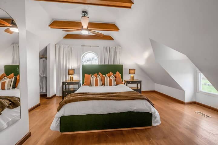 Located on the third floor, bedroom #5 features a queen bed.