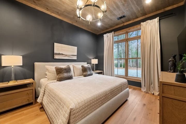 Unwind in comfort with a luxurious bed and serene ambiance.