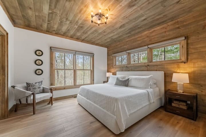 Unwind in comfort with a luxurious bed and serene ambiance.