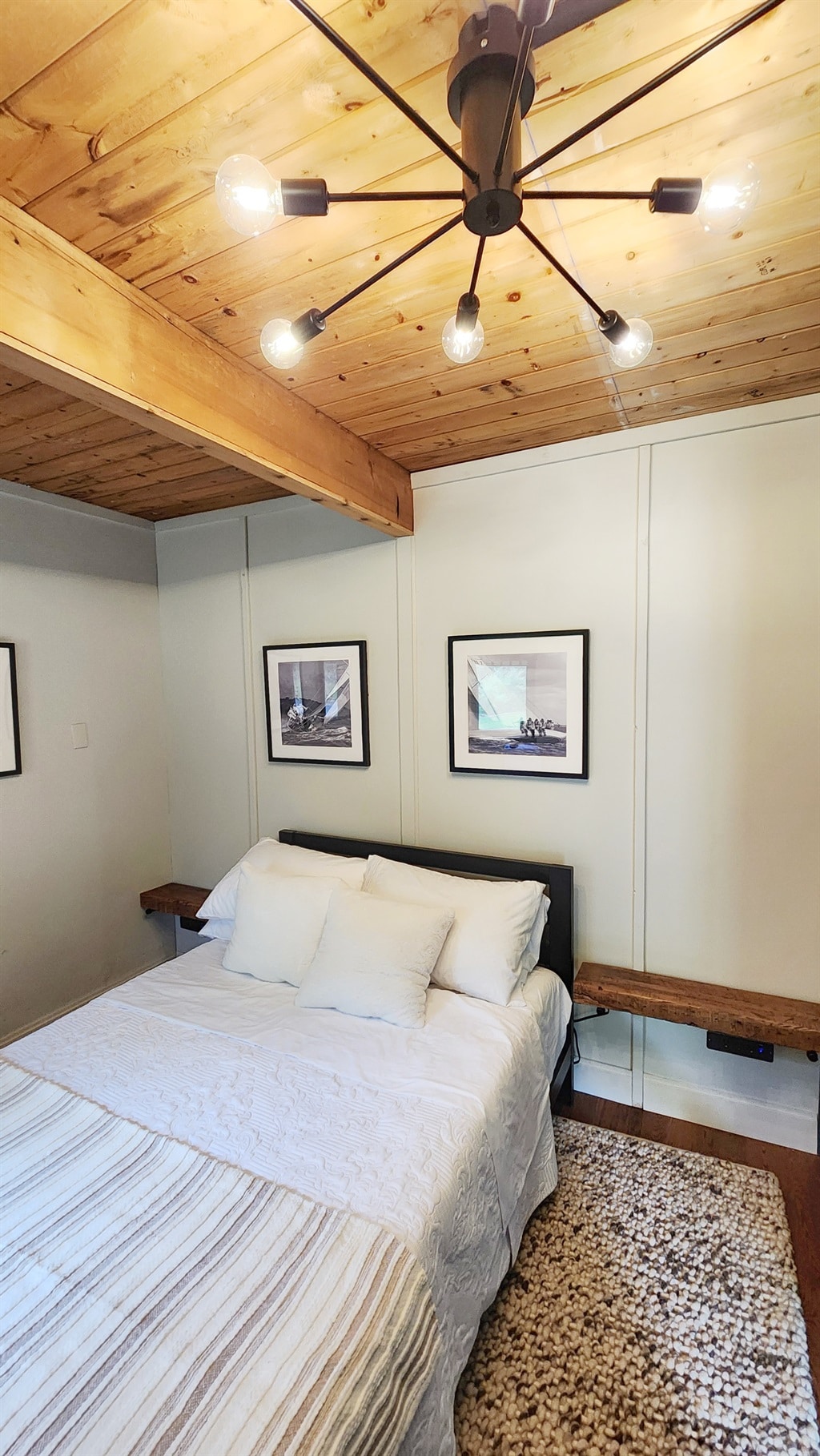 Stay in the Porch View Bedroom on the first floor, featuring a comfy full bed and a wide doorway for accessibility. Enjoy easy access and beautiful views for a restful and convenient stay.