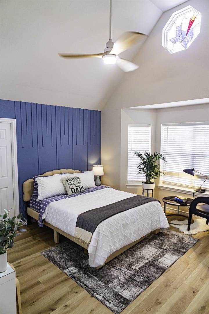 In the second bedroom of the lakehouse, a cozy reading area beckons, offering a tranquil retreat for moments of solitude and reflection. 