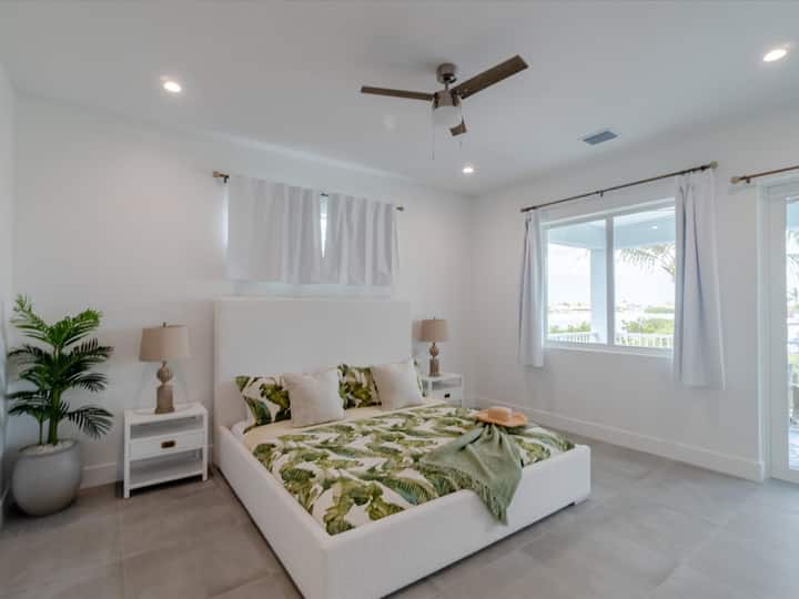 2nd level master suite 1 with a king memory foam bed soft, but firm and with water views.