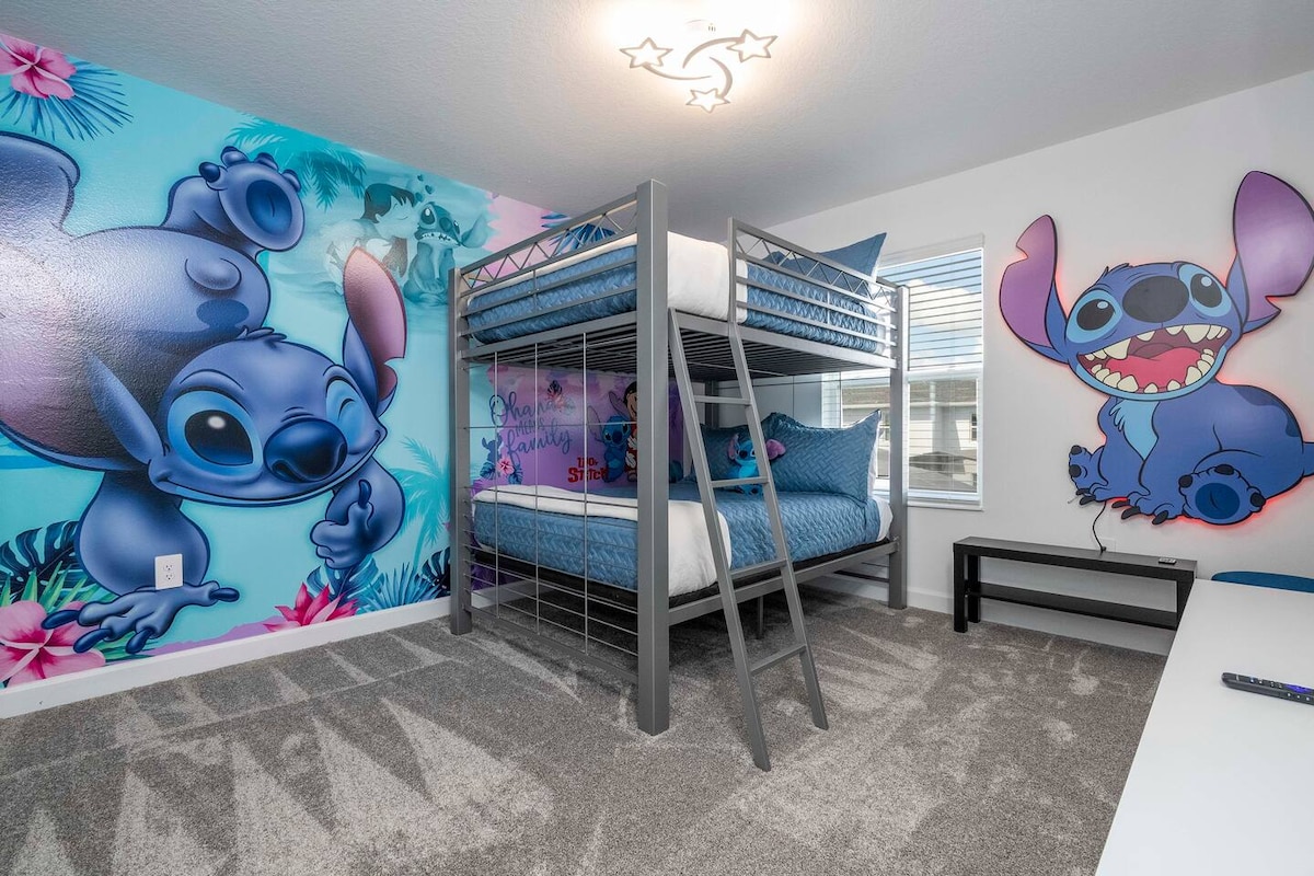 Super fun Lilo and Stich decor witha  bunk bed full over full