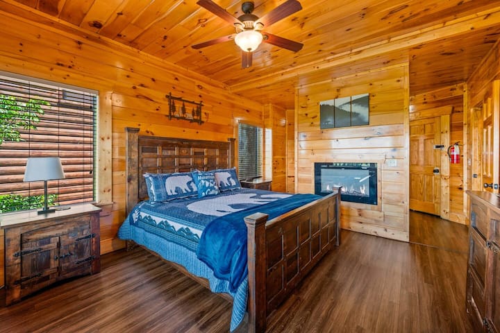 Bedroom 1:  King bed, ensuite bathroom with shower, electric fireplace and access to hot tub. (lower level)